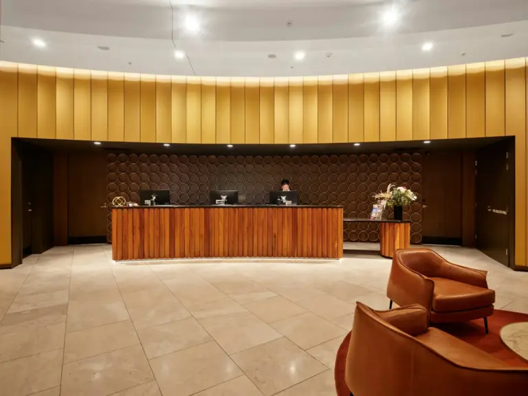 Hotel reception desk and lobby seating