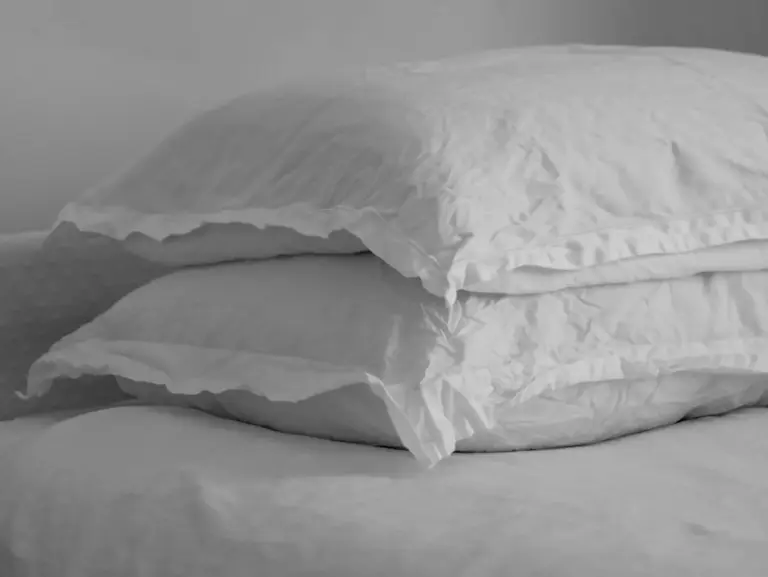 Stacked soft white pillows